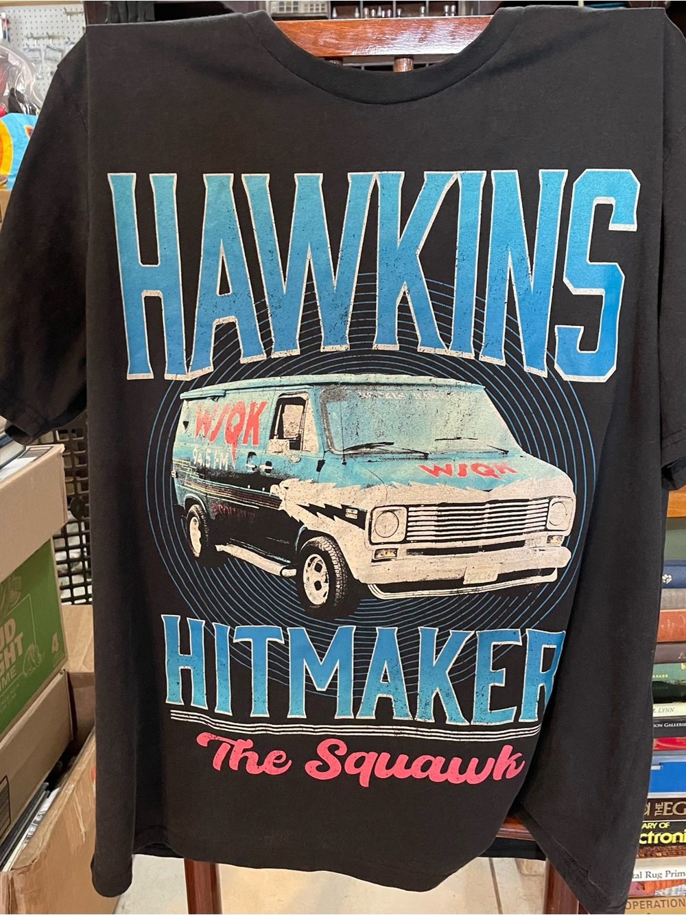 Netflix Hawkins Hitmaker Graphic Tee - Black, Blue, Pink
